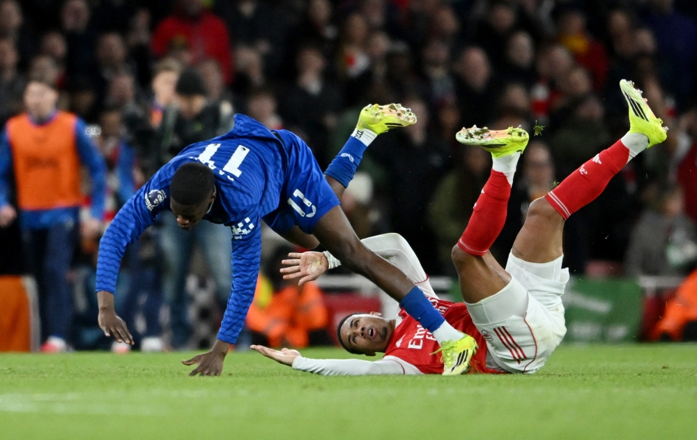 Everton's Thierno Barry in action with Arsenal's Gabriel Magalhaes during the Premier League match between Arsenal and Everton at Emirates Stadium, London March 14, 2026. — Reuters pic 