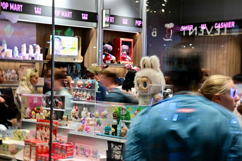 Hong Kong‑listed toymaker Pop Mart is opening larger‑format stores as well, including a new outlet on the first floor of The Central mall in Nanjing on February 1 that drew heavy foot traffic. — AFP pic