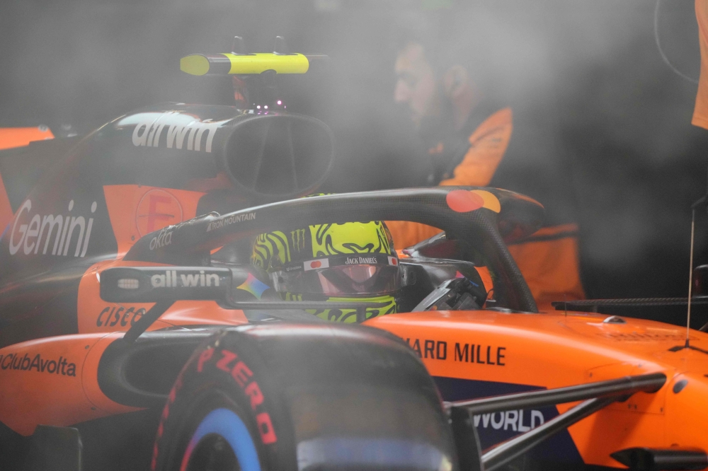 McLaren's British driver Lando Norris sits in his car in the pits during the qualifying session ahead of the Formula One Chinese Grand Prix at the Shanghai International Circuit in Shanghai on March 14, 2026. — AFP pic 