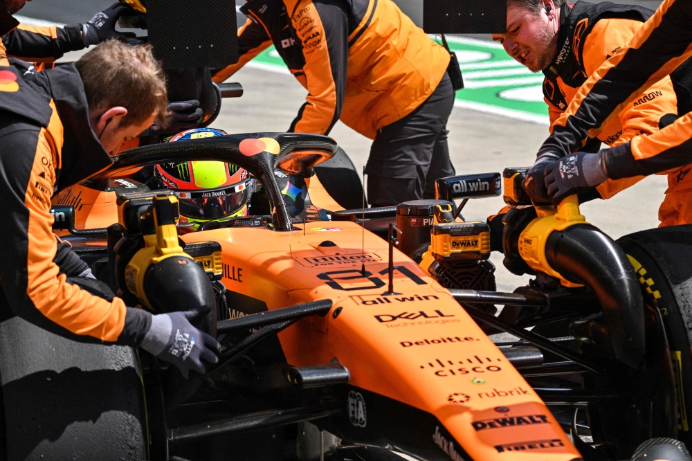Mechanics work on the car of McLaren's Australian driver Oscar Piastri during a practice session ahead of the Formula One Chinese Grand Prix at the Shanghai International Circuit in Shanghai on March 13, 2026. — AFP pic 