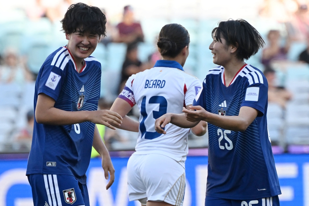 Japan’s Toko Koga celebrates her goal with teammate Remina Chiba during the AFC Women’s Asian Cup Australia 2026 quarter-final between Japan and the Philippines at Accor Stadium in Sydney on March 15, 2026. — AFP pic