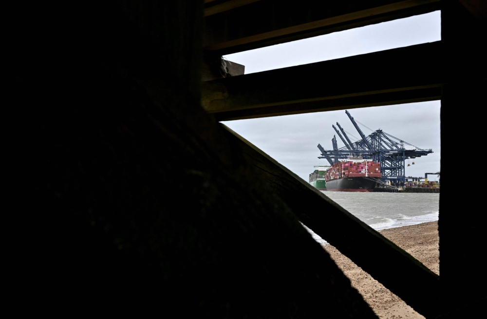 Transit through the Strait of Hormuz has been closed off by Iran, making the shipment of goods via sea routes difficult. — AFP pic