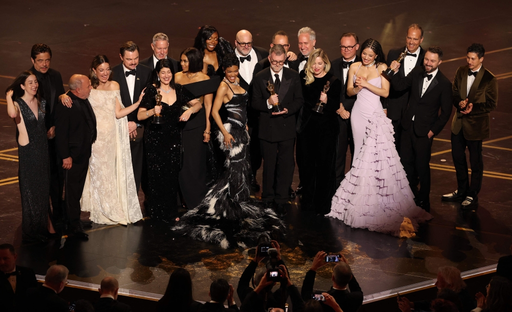 US filmmaker Paul Thomas Anderson and producer Sara Murphy accept the Best Picture award for ‘One Battle After Another’ with cast and crew onstage at the 98th Academy Awards, Dolby Theatre, Hollywood, March 15, 2026. — AFP pic