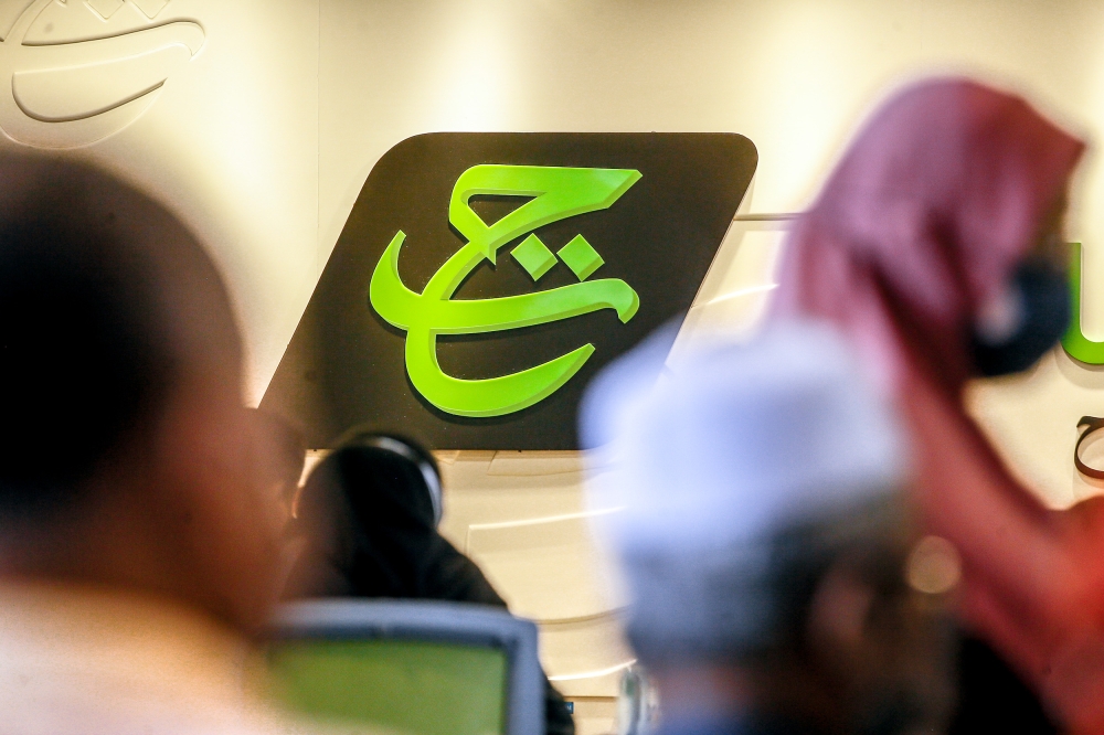 Following the launch of a more modern and user-friendly website, Lembaga Tabung Haji has rolled out a digital queue system for counter services across all its branches, effective yesterday. — Picture by Hari Anggara