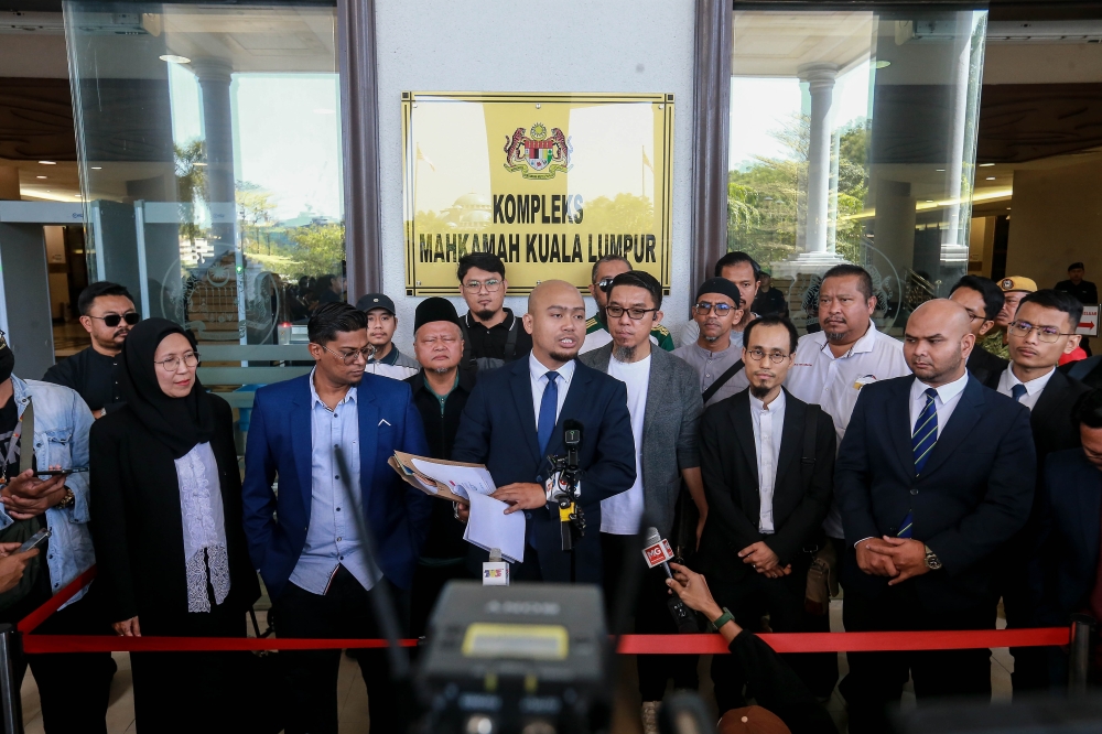Lawyer Muhammad Hariz Md Yusoff holds a press conference at the Kuala Lumpur Court Complex on March 17, 2026. — Picture by Sayuti Zainudin