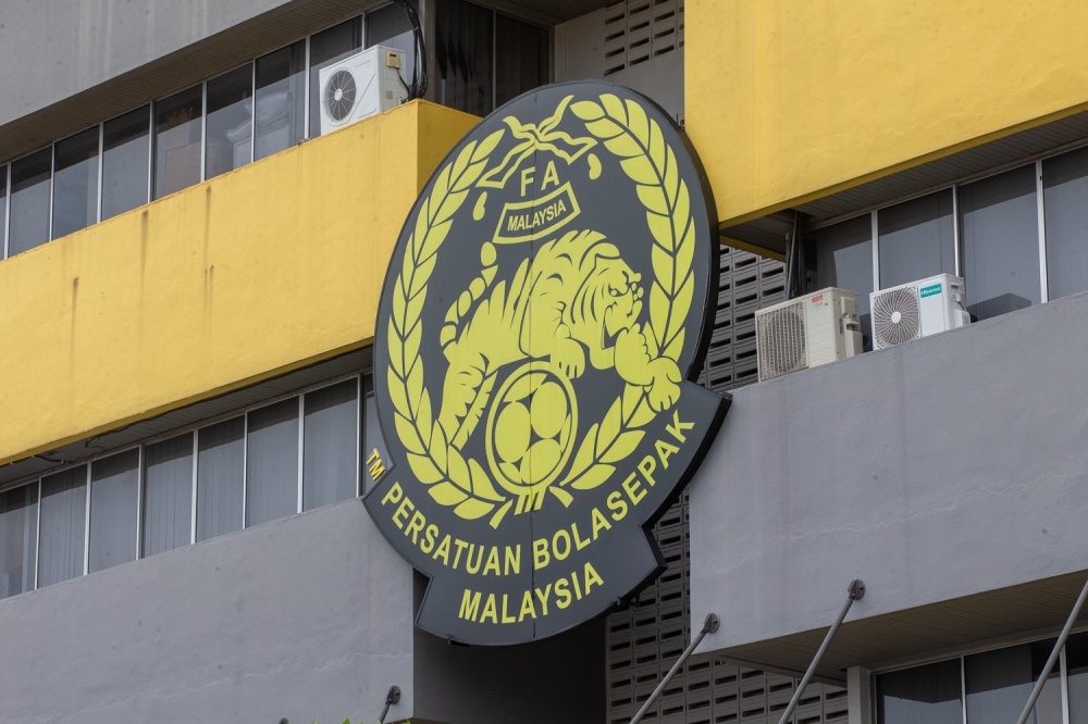 The Asian Football Confederation (AFC) has sanctioned the Football Association of Malaysia (FAM) for fielding ineligible players during Asian Cup 2027 qualifying matches, resulting in forfeits and a fine. — Picture by Raymond Manuel