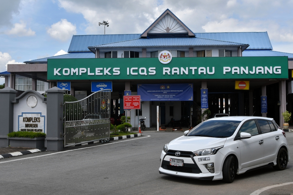 Three Hino and Isuzu lorries, and a Proton Wira car were the vehicles seized alongside their petrol and diesel stored in modified tanks at the Rantau Panjang Complex in Kelantan on March 16, 2026 during a morning inspection. — Bernama pic