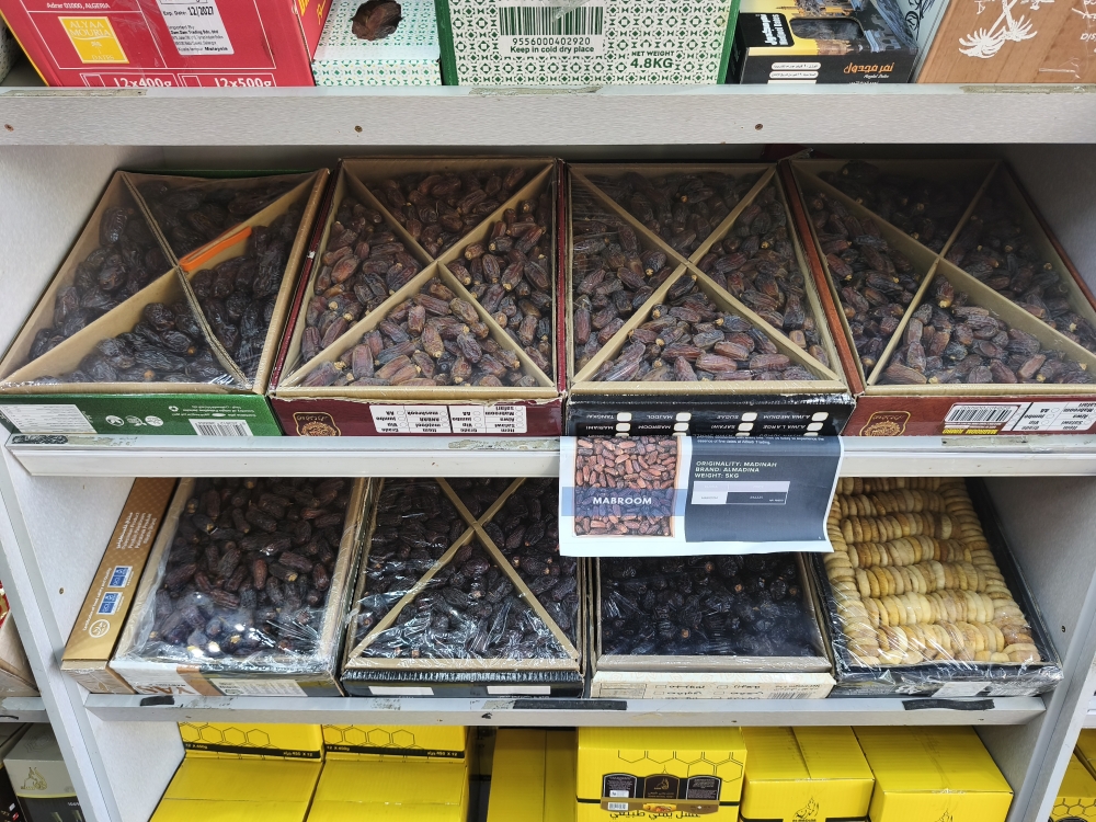 Different varieties of imported dates from the Middle East on display at Al Badr Trading in Danau Kota, Setapak. — Picture by Kenneth Tee