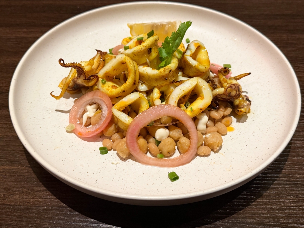 Mediterranean inspired Squid & Butter Bean Ragu offers a light seafood dish to balance the heavier flavours. — Picture by Lee Khang Yi