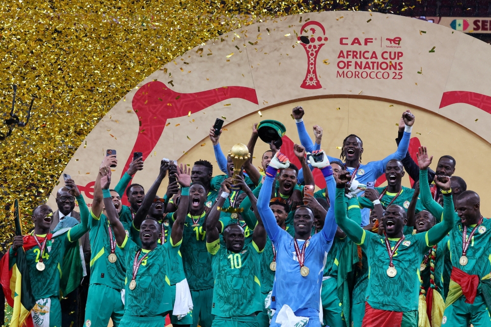 Senegal’s Sadio Mane lifts the Africa Cup of Nations trophy with teammates after their final win over Morocco in Rabat on January 18, 2026. — AFP pic