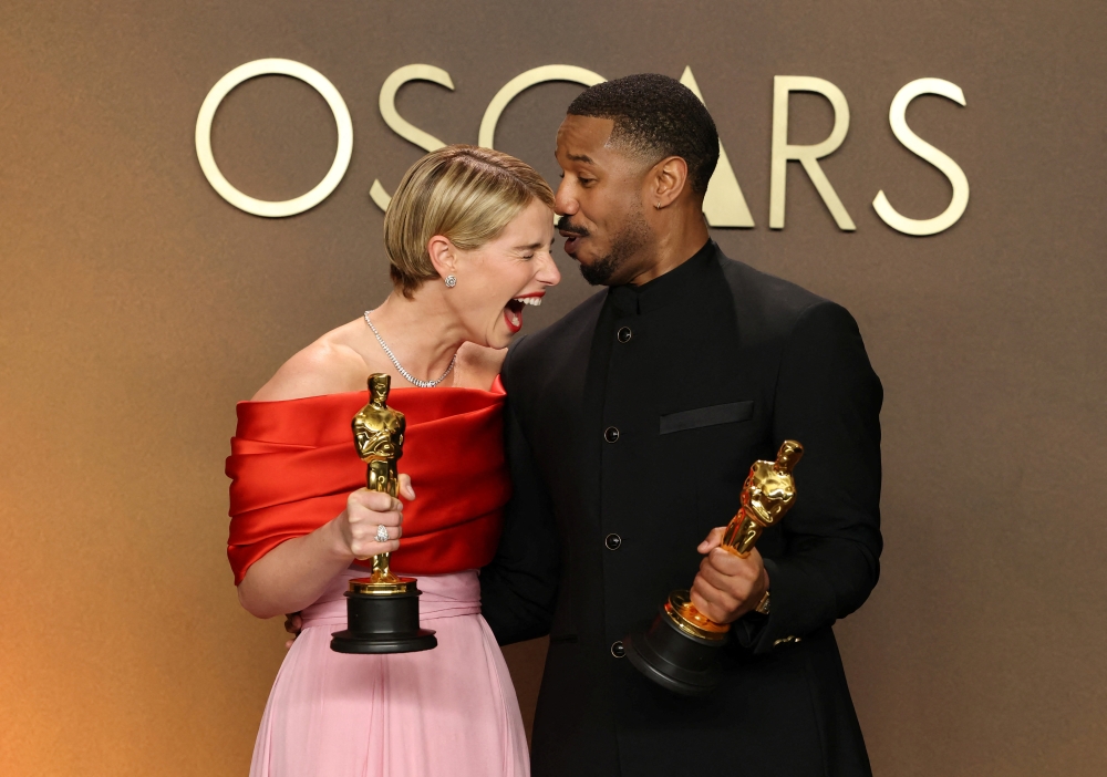 Jessie Buckley, winner of the Oscar for Best Actress for ‘Hamnet’, and Michael B. Jordan, winner of the Oscar for Best Actor for ‘Sinners’, pose together at the 98th Academy Awards in Los Angeles March 15, 2026. The 2026 Oscars drew 17.9 million viewers in the US, down 9 per cent from the previous year. — Reuters pic