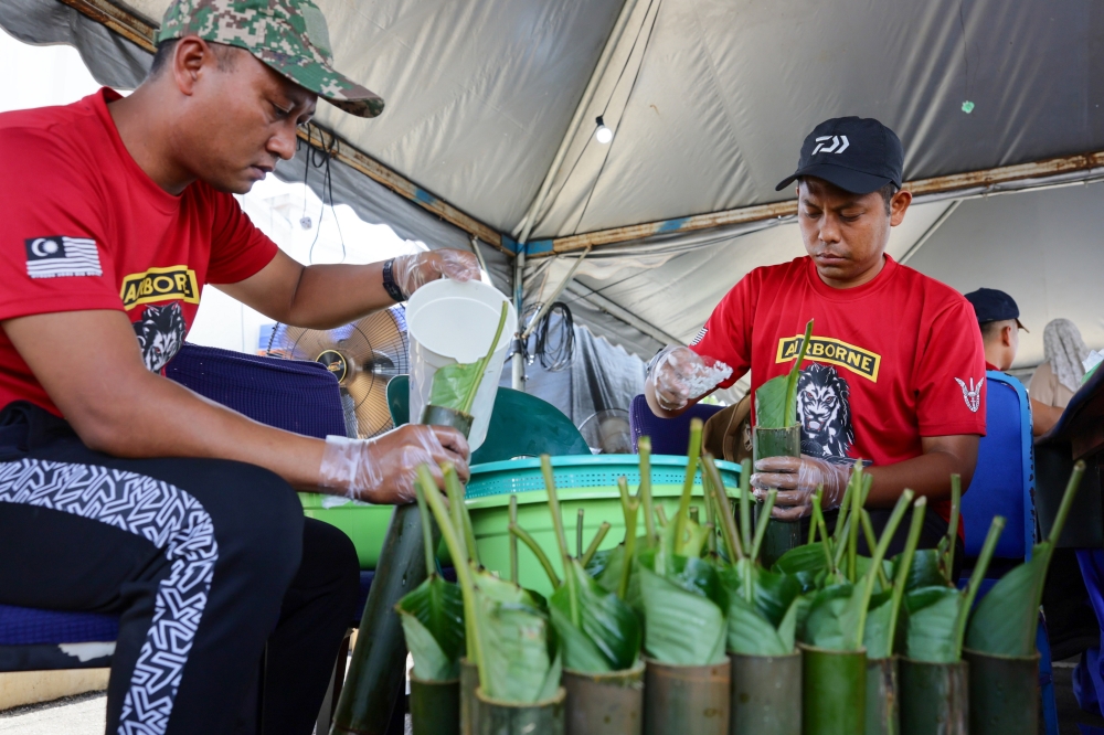 Mohd Ashafiq said the uniqueness of Lemang Tok Singa, a name inspired by the unit’s identity, lies in the use of daun lerek, which gives it a more fragrant aroma and better taste. — Bernama pic