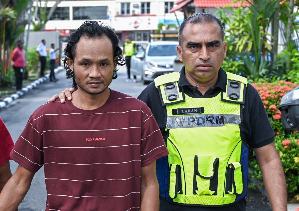 Indonesian oil palm harvester Sutiyono is brought to the Teluk Intan Magistrate’s Court on March 18, 2026.  — Bernama pic