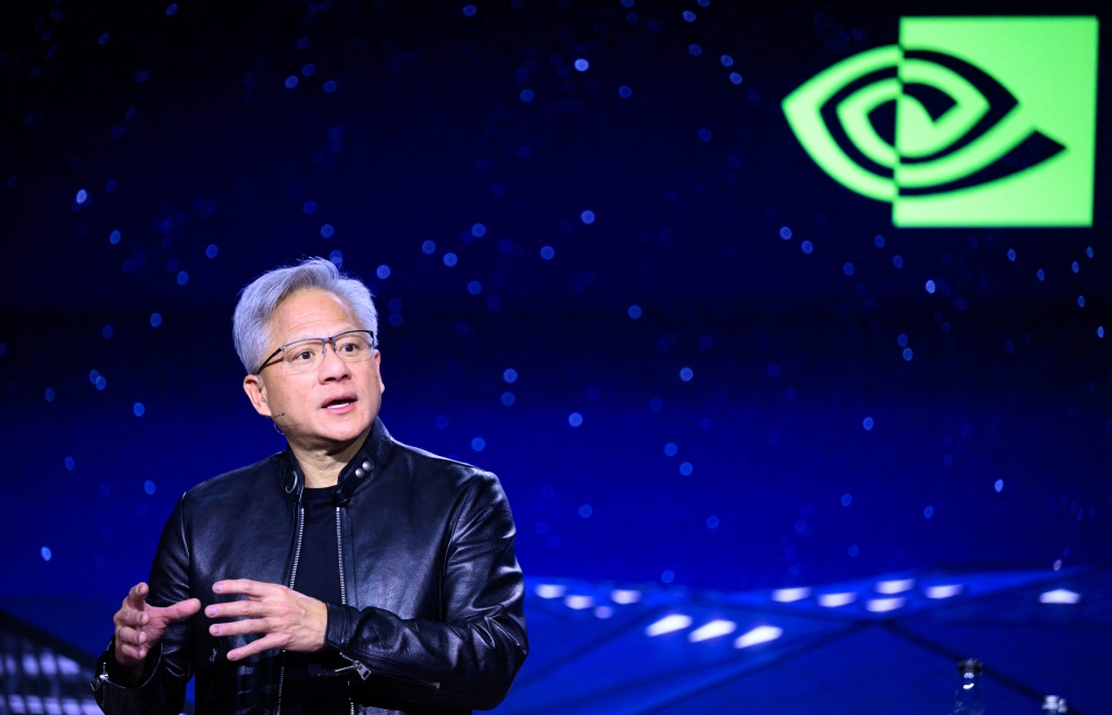 Nvidia chief Jensen Huang on Tuesday said the AI technology powerhouse is restarting production of its high-performance chips for clients in China. — AFP pic