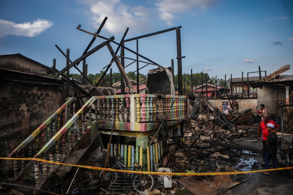 Five houses were destroyed in a fire incident in Kampung Pulau Ketam, Kuala Perlis on Tuesday, but no casualties were reported. — Bernama pic
