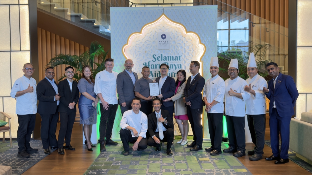 Hyatt Regency Kuala Lumpur (HRKL) general manager Till Martin (sixth from left) is pictured with members of the hotel’s dedicated Halal Committee. — Picture courtesy of HRKL 