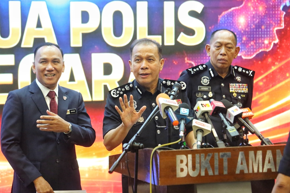 Inspector-General of Police Datuk Seri Mohd Khalid Ismail gestures during a press conference at Bukit Aman in Kuala Lumpur on March 19, 2026. — Picture by Choo Choy May