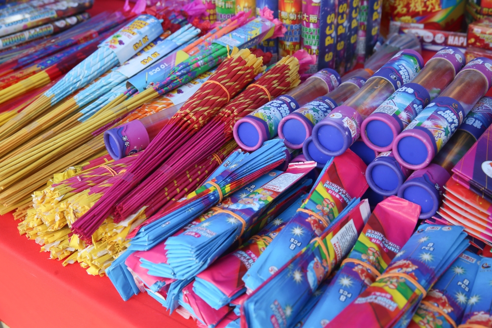 Fireworks and firecrackers are displayed for sale at a stall in Overseas Union Garden (OUG), Kuala Lumpur on February 12, 2025. — Picture by Choo Choy May