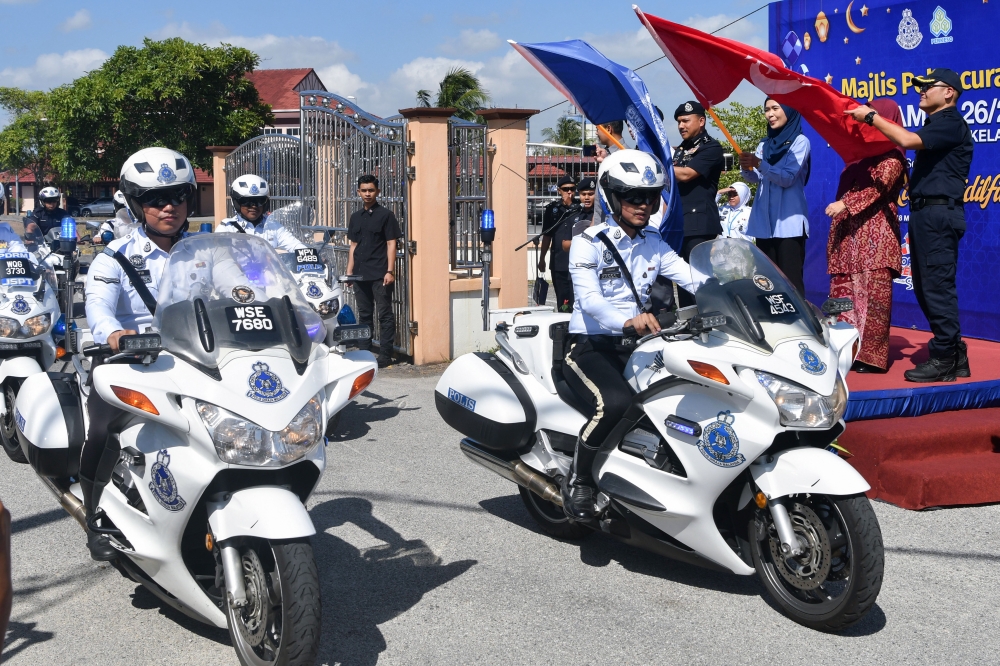 Traffic police take part in the state-level Op Selamat 26/2026 launch in Tunjong, Kota Bharu on March 18, 2026. — Bernama pic