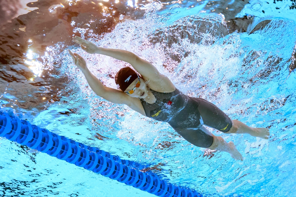 An underwater view shows China's swimmer Yu Zidi as she competes in a heat of the women's 400m individual medley swimming event during the 2025 World Aquatics Championships in Singapore on August 3, 2025. — AFP file pic