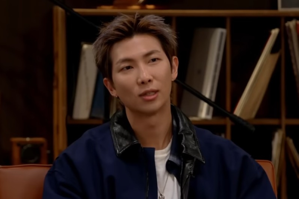 Big Hit Music said RM suffered an ankle sprain, partial ligament tear and talus contusion on March 19 and has been advised to minimise movement for two weeks, though he said he will still perform. — Screengrab via Youtube/BANGTANTV