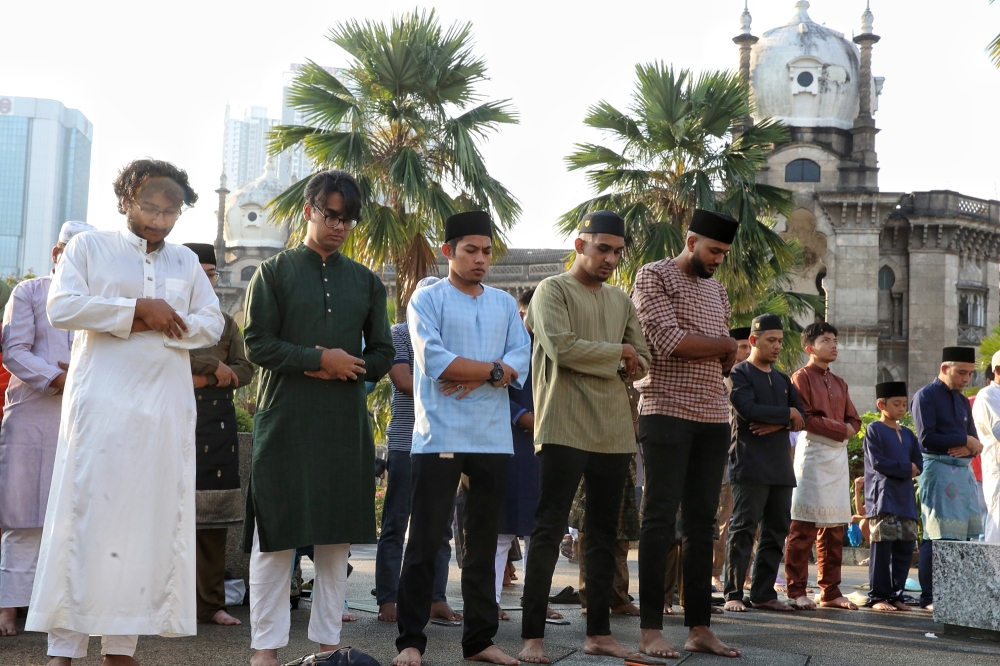 Muslims perform special morning prayers on the first day of Syawal to celebrate Hari Raya Aidilfitri at National Mosque in Kuala Lumpur March 21, 2026. — Picture by Choo Choy May
