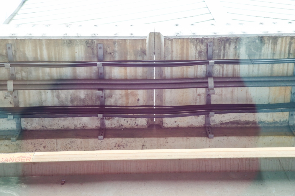 Various cables, from those powering trains to signalling systems, run along the 116km-long MRT Kajang and Putrajaya Lines, disrupting operations when a theft occurs. — Picture by Choo Choy May