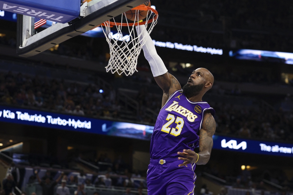 Los Angeles Lakers forward LeBron James (23) drives to the basket against the Orlando Magic in the first quarter at Kia Centre March 21, 2026. — Nathan Ray Seebeck-Imagn Images/Reuters pic 
