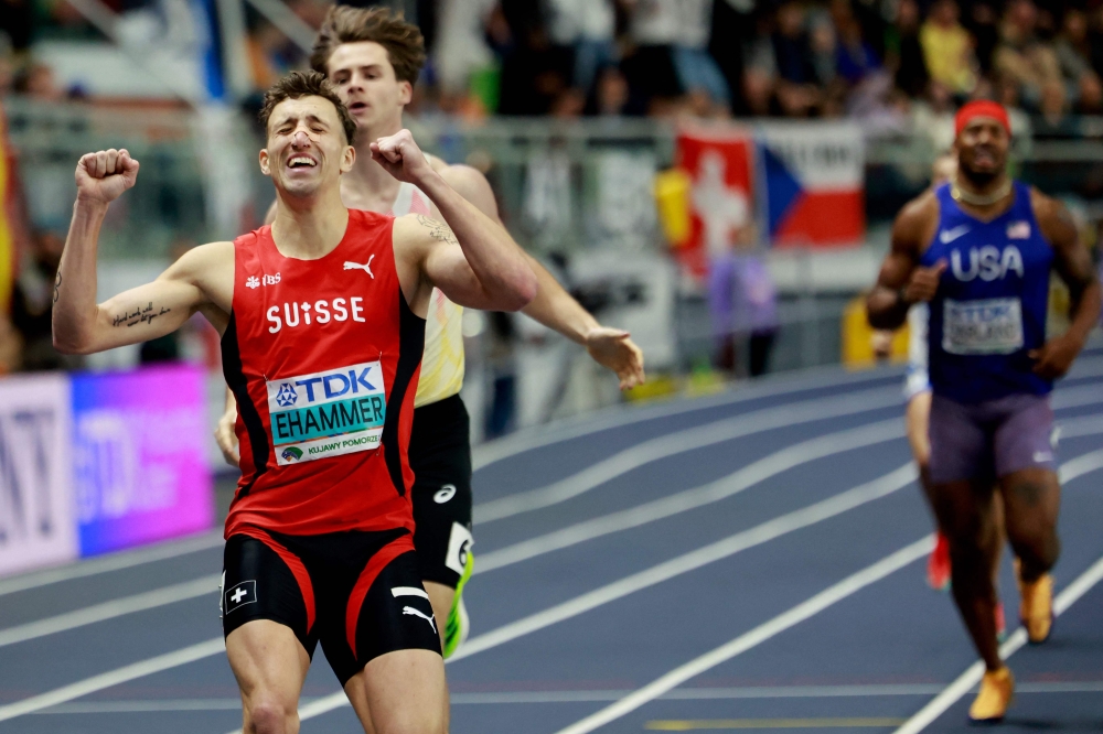 Switzerland’s Simon Ehammer crosses the line to take gold in the men’s heptathlon 1,000m final during the World Athletics Indoor Championships Kujawy Pomorze 2026 in Torun, Poland on March 21, 2026. — AFP pic