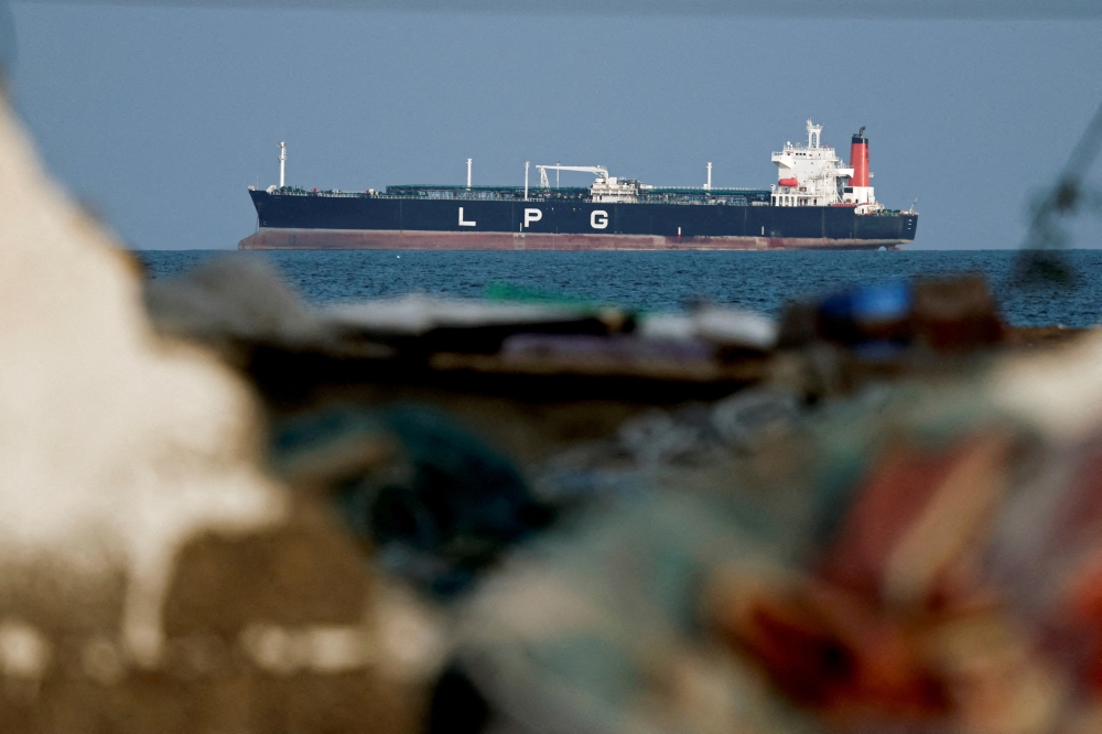 This file picture shows an LPG gas tanker at anchor in the Strait of Hormuz, amid the US-Israeli conflict with Iran, in Shinas, Oman, March 11, 2026. — Reuters pic