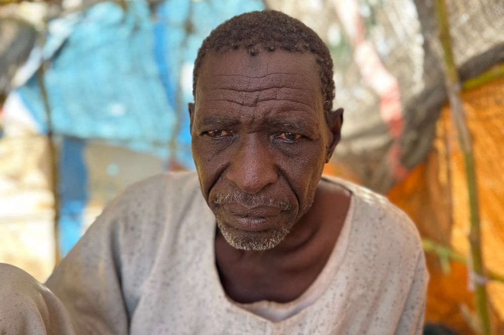 Sudanese displaced Ahmed Aman, who says he was imprisoned and tortured in Rapid Support Forces’ (RSF) prisons before fleeing El-Fasher, sits at a makeshift shelter in the town of Tawila, in war-torn Sudan’s western Darfur region on March 2, 2026. — AFP pic