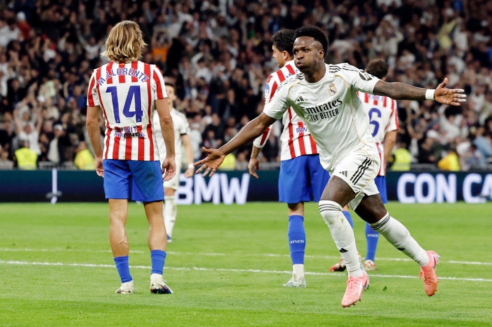 Vinicius Junior celebrates scoring Real Madrid’s third goal against Atletico Madrid at the Santiago Bernabeu Stadium in Madrid on March 22, 2026. — AFP pic