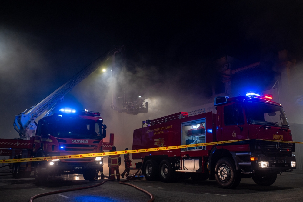 Although the forest was located near a residential area, the situation remained under control. — Bernama pic 