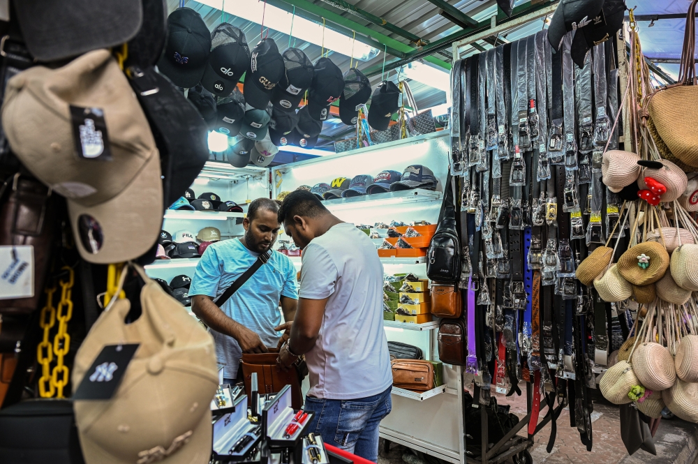 Sales of imitation goods tend to intensify during festive seasons, despite enforcement efforts. — Bernama pic