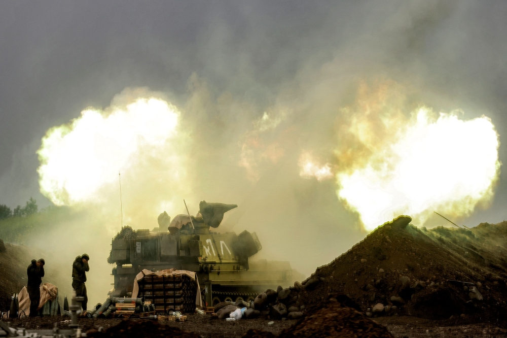 An Israeli self-propelled howitzer artillery gun fires rounds towards southern Lebanon from a position in the upper Galilee in northern Israel near the border on March 20, 2026. — AFP pic