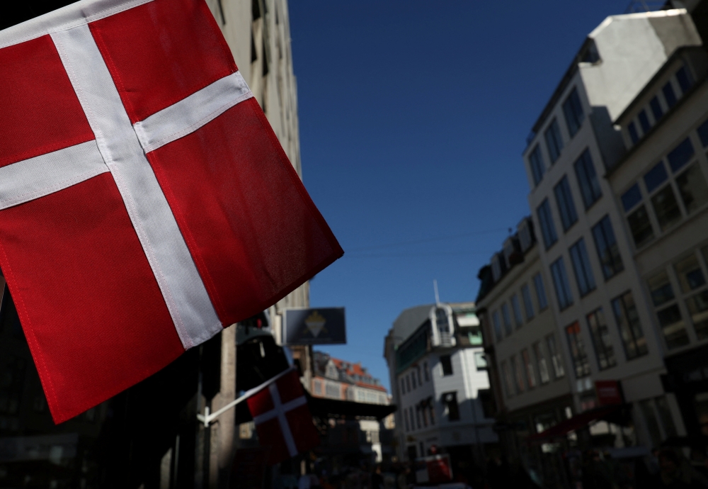 A Danish flag flutters on a street ahaed of parliamentary elections in Copenhagen, Denmark, March 22, 2026. — Reuters pic
