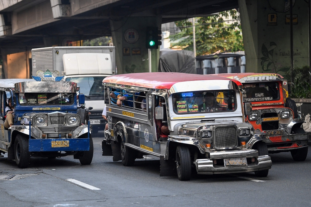 The makeshift minibus named Princess is part of a smoke-belching, colourfully decorated fleet that forms the backbone of a Philippine transportation sector being hammered by surging fuel prices driven by the US-Israeli war with Iran. — AFP pic