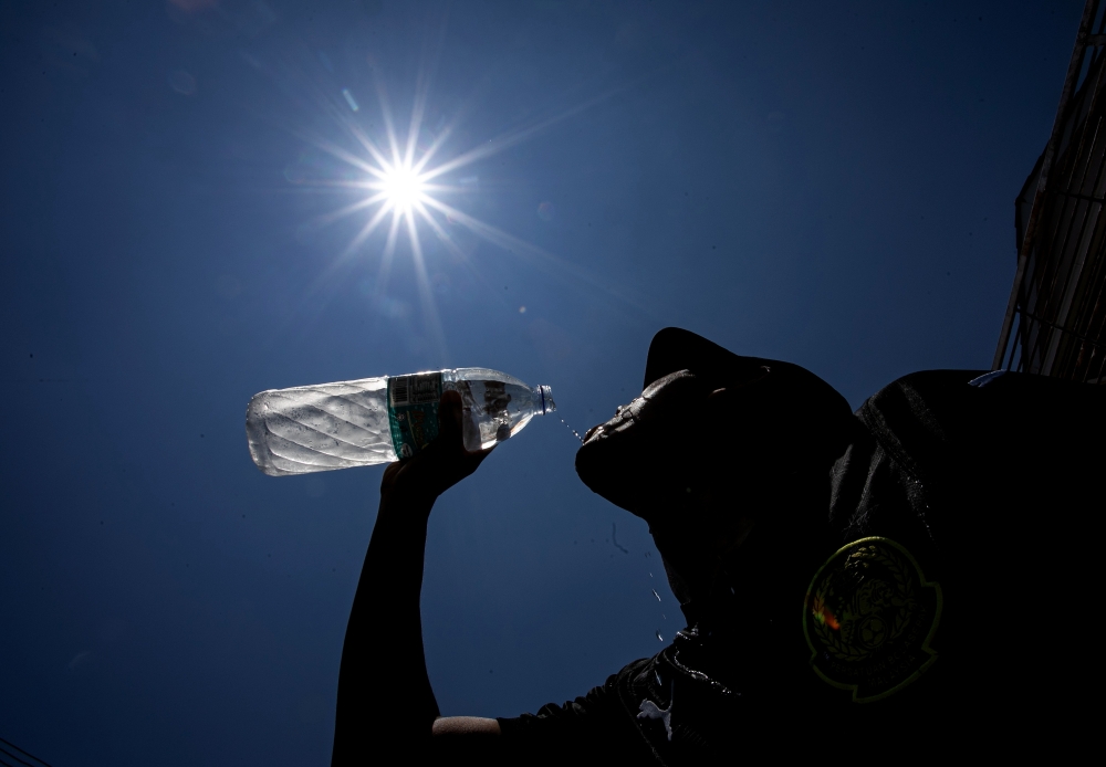 The heatwave currently affecting the country not only increases health risks but may also lead to long-term physiological complications such as heatstroke. — Bernama pic