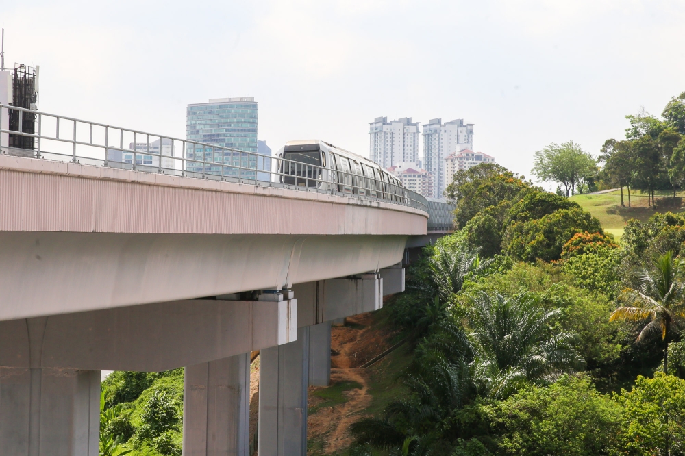 Hillside terrain and ground-level access near the Phileo Damansara station on the MRT Kajang Line provide natural cover and multiple informal entry points. — Picture by Choo Choy May