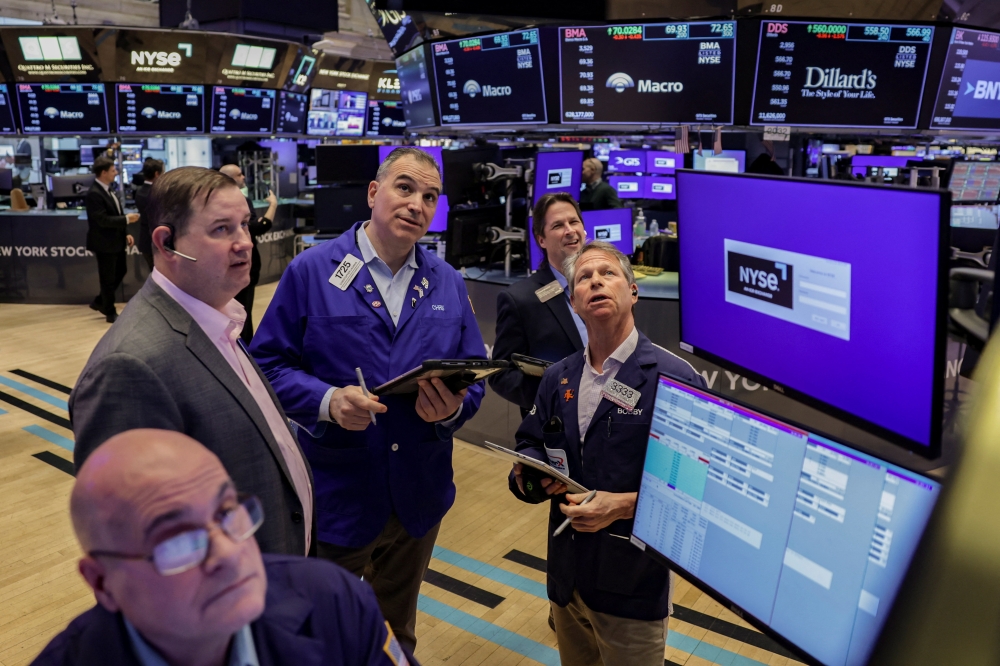 US stocks slipped as investors balanced optimism over potential talks with concerns about higher oil prices and a prolonged conflict. — Reuters pic