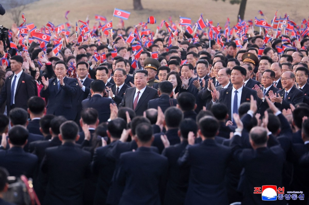 This picture taken on March 23, 2026 and released by North Korea’s official Korean Central News Agency (KCNA) on March 24, 2026 shows North Korean leader Kim Jong Un (centre) heading toward the venue for a commemorative performance following the conclusion of the First Session of the 15th Supreme People’s Assembly in Pyongyang. — AFP pic