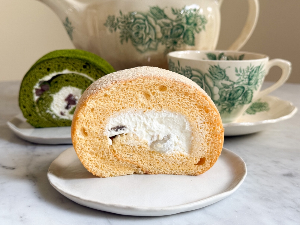 Fluffy Kinako Roll Cake with the lightest whisper of fresh cream offers subtle flavours. 