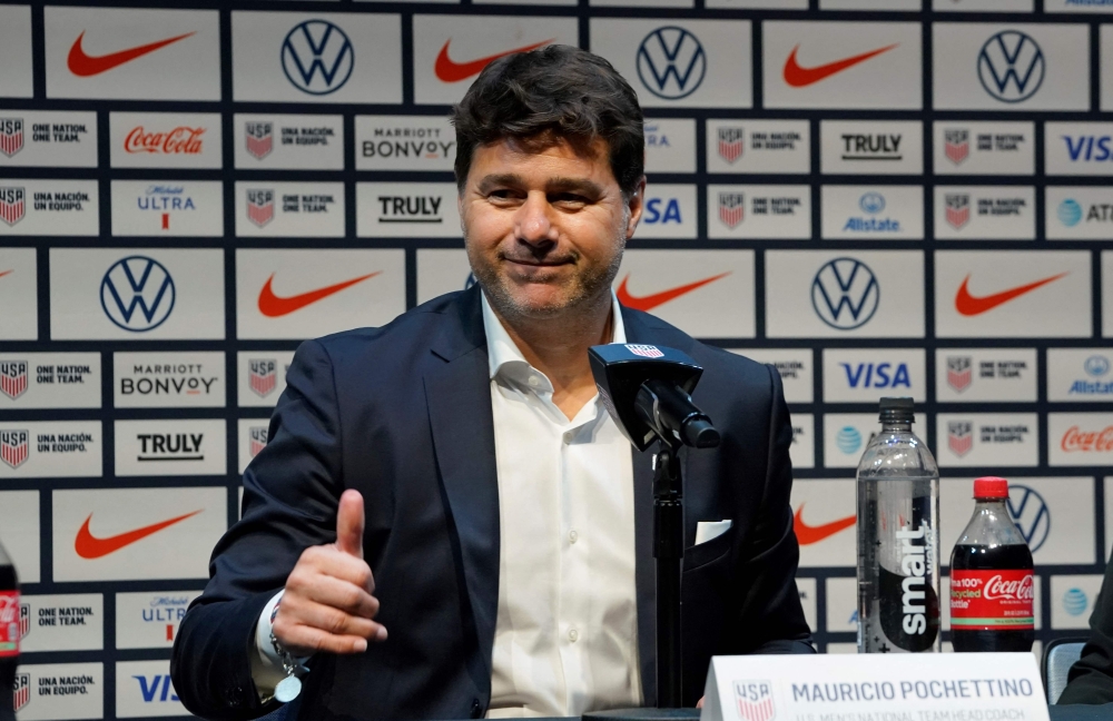 Pochettino, now US coach, admitted he still craves the challenge of the Premier League. — AFP pic