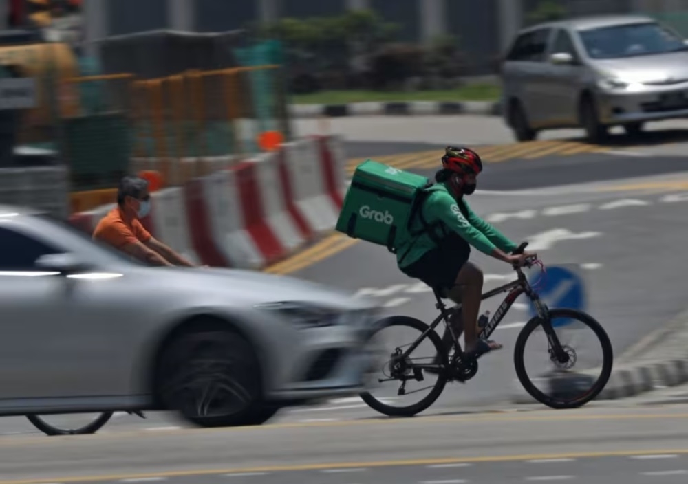 Singapore’s roads remain the most dangerous workplace, with delivery riders and drivers facing the highest risks. — TODAY pic