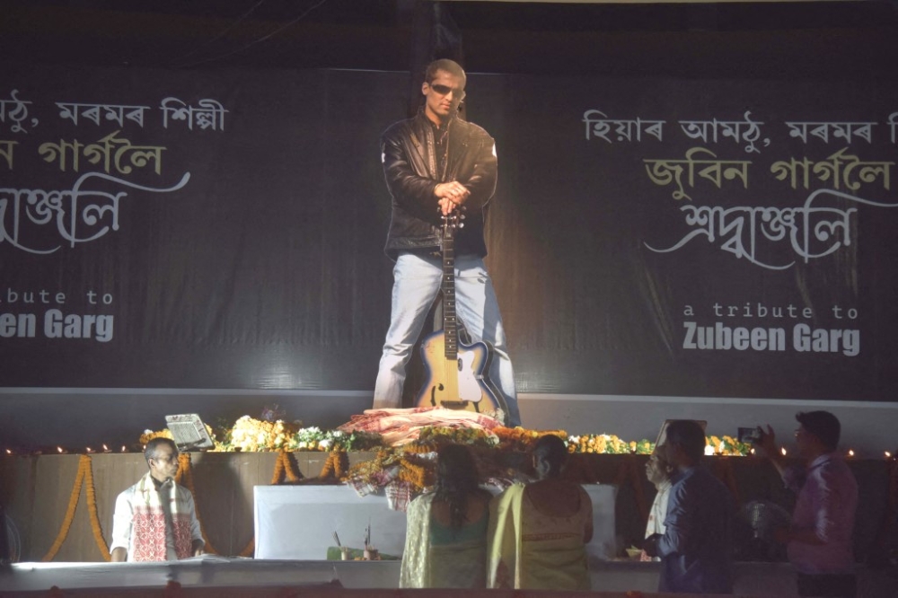 Fans pay tribute to the portrait of Zubeen Garg at the Nagaon Baptist Church in Nagaon District, Assam, India, September 24, 2025. — AFP pic