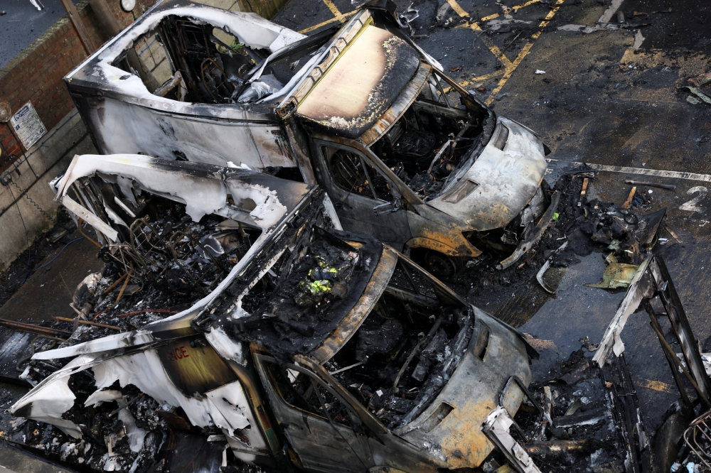 Charred remains of ambulances belonging to Hatzola, a Jewish community organisation, which were set on fire in an incident that the police say is being treated as an antisemitic hate crime, in north-west London March 23, 2026. — Reuters pic