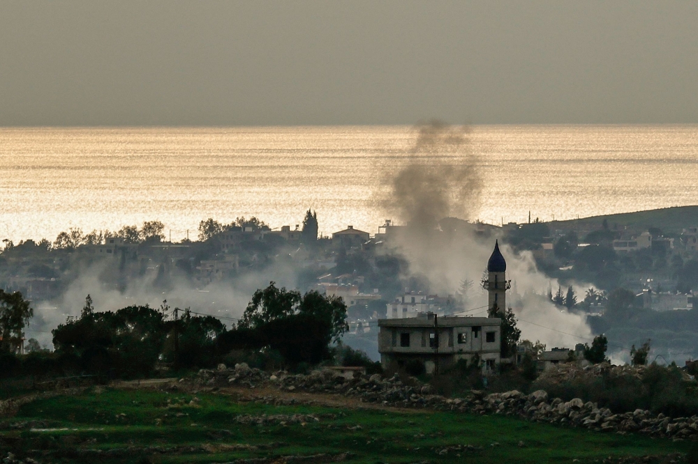 A photograph taken from the southern Lebanese area of Marjeyoun shows smoke as it rises from a site targeted by Israeli artillery in the village of Zawtar El Charkiyeh on March 25, 2026. — AFP pic
