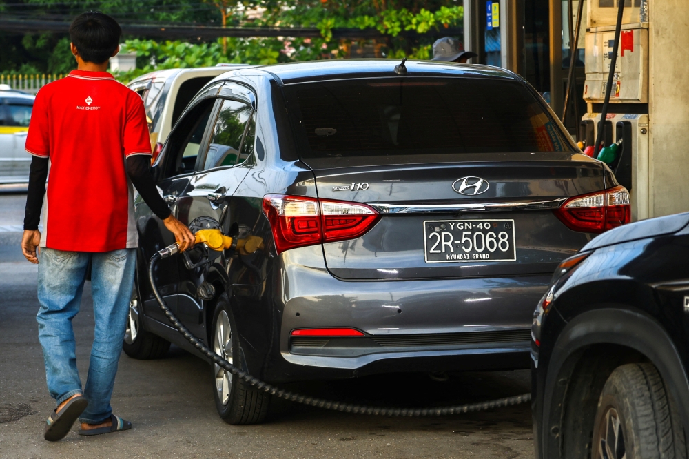 A vehicle gets refueled at a petrol station amid the US-Israeli war on Iran in Yangon, Myanmar on March 20, 2026. — Reuters pic