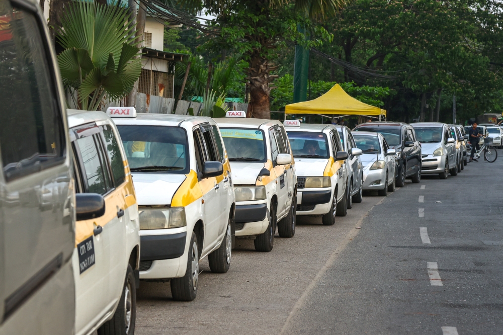 Drivers queue to refuel at a petrol station amid the US-Israeli war on Iran in Yangon, Myanmar on March 20, 2026. — Reuters pic