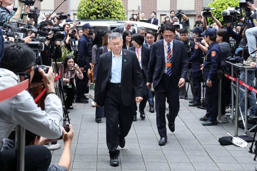 Former Taipei mayor and 2024 presidential candidate Ko Wen-je arrives at the Taipei District Court in Taipei March 26, 2026. — AFP pic